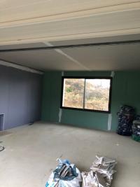 TRAVAUX D'INSONORISATION ENTRE UN GARAGE ET UNE CHAMBRE A DIVES SUR MER PRES DE CAEN